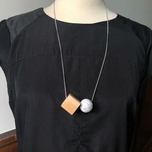 Long geometric marble and wood block necklace